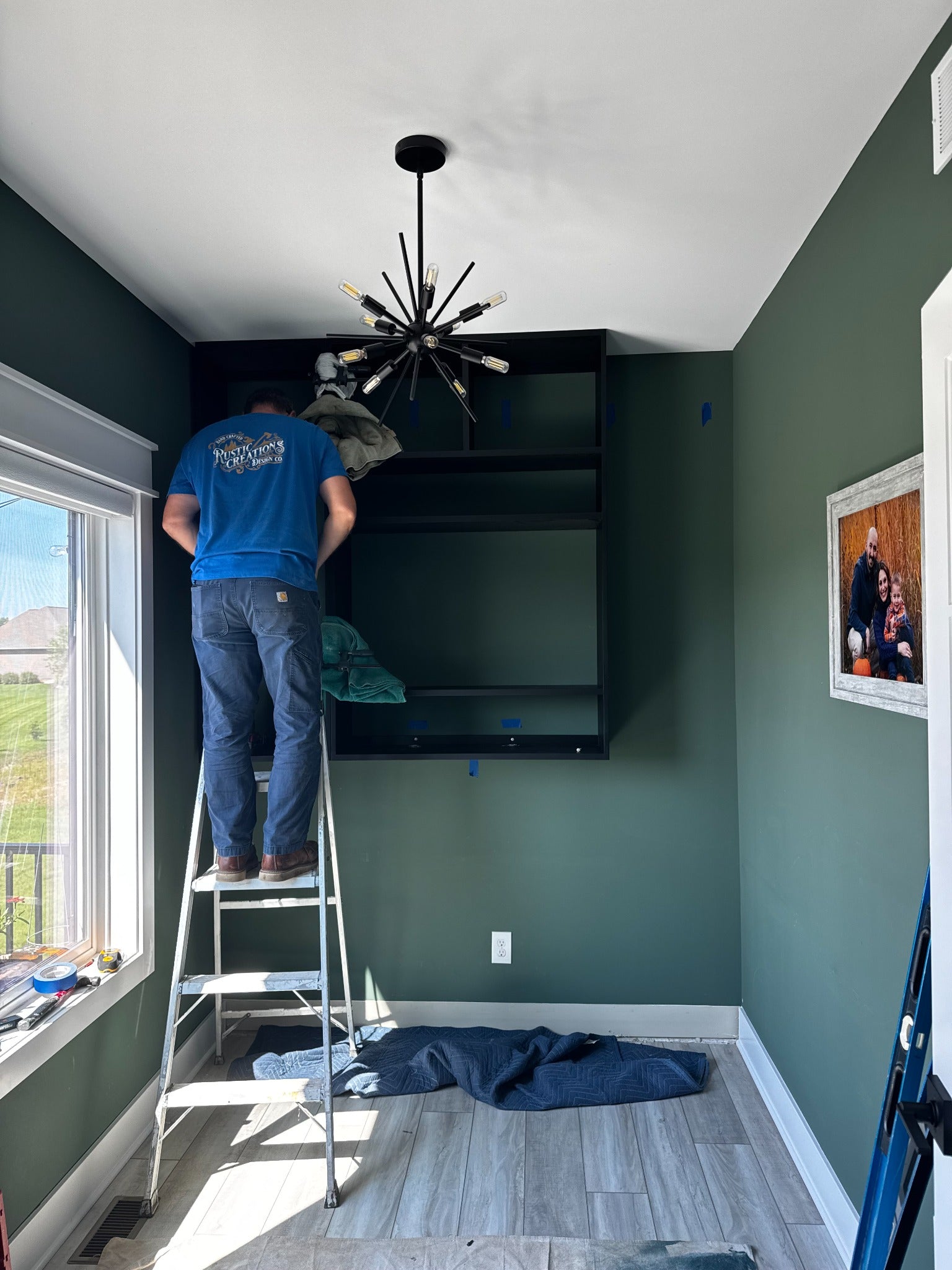 Rustic Creations installing the office built-in